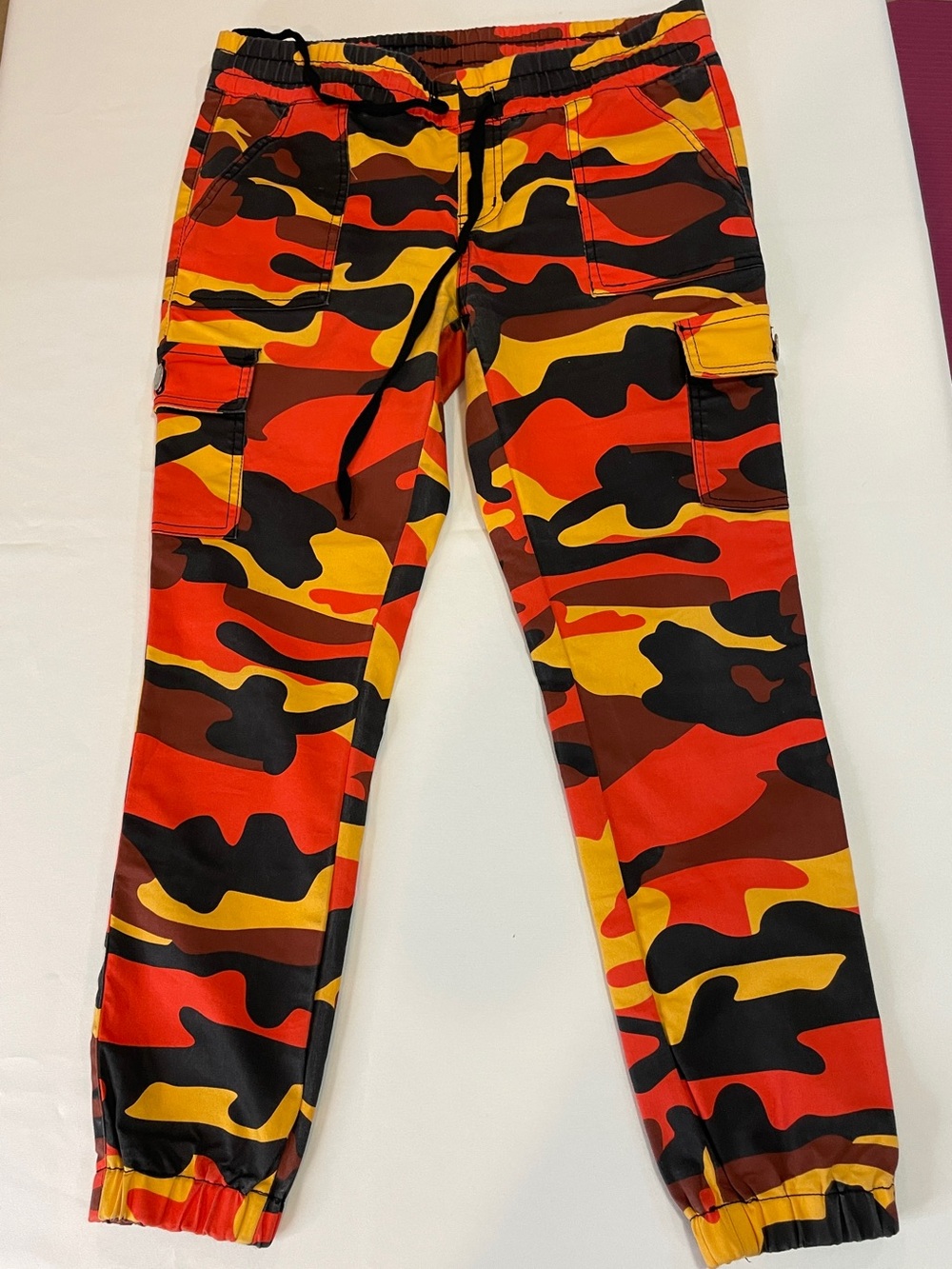 V.I.P. Women’s Cargo Joggers - Red Orange Yellow Camo